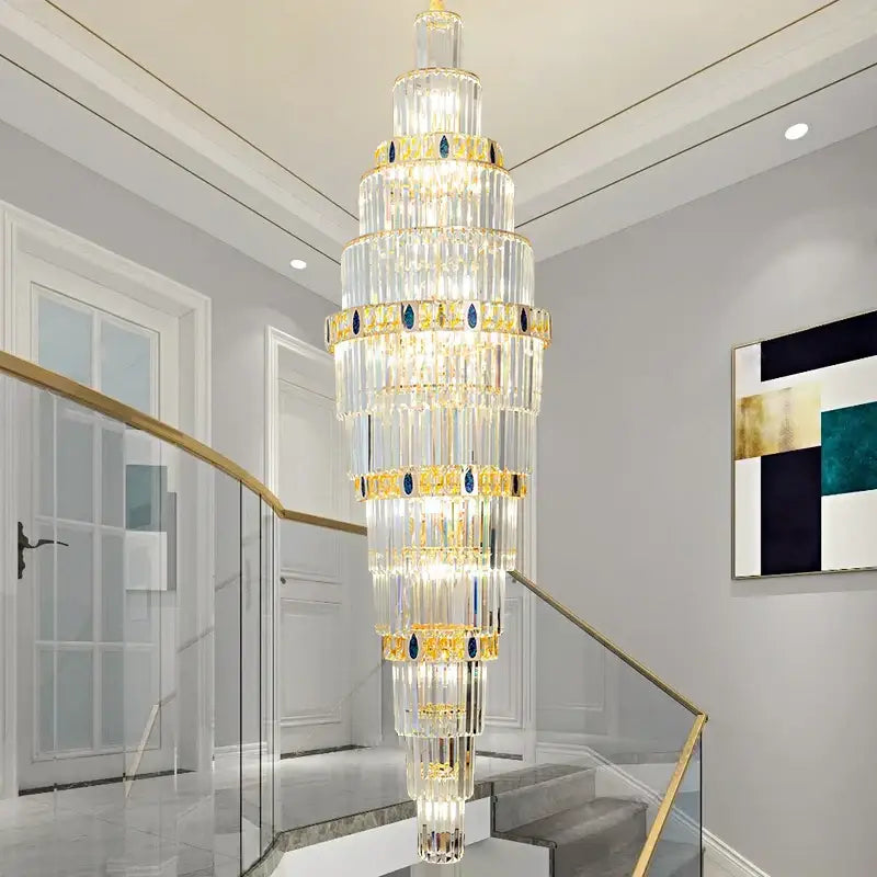 DecorBites crystal chandelier featuring multi-tiered crystal design with gold accents and blue gemstones for luxury lighting