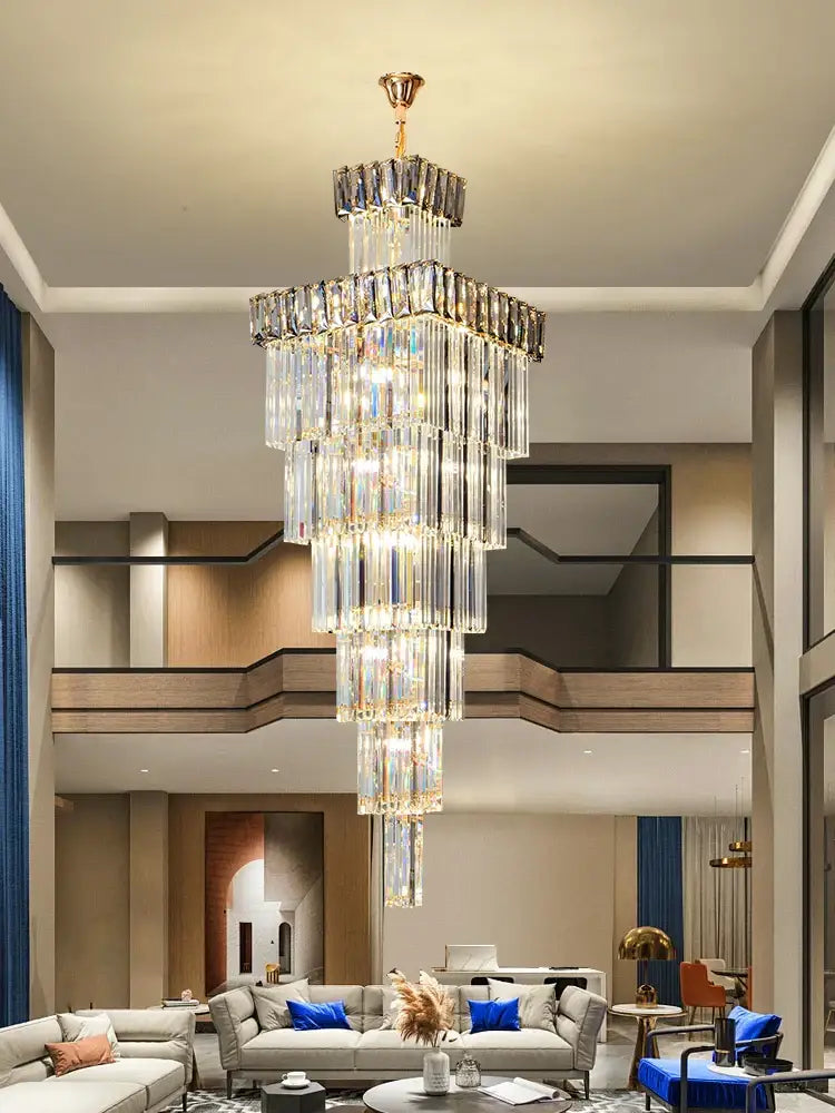 Decorbites crystal chandelier with gold-toned mount and cascading rectangular glass prisms for villa staircases