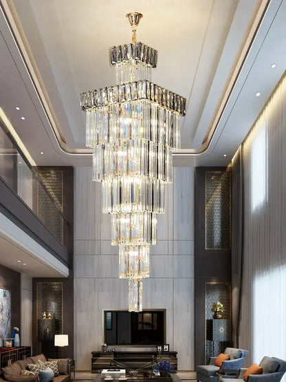 Decorbites crystal chandelier with gold-toned top and clear glass prisms hanging in elegant villa staircase room