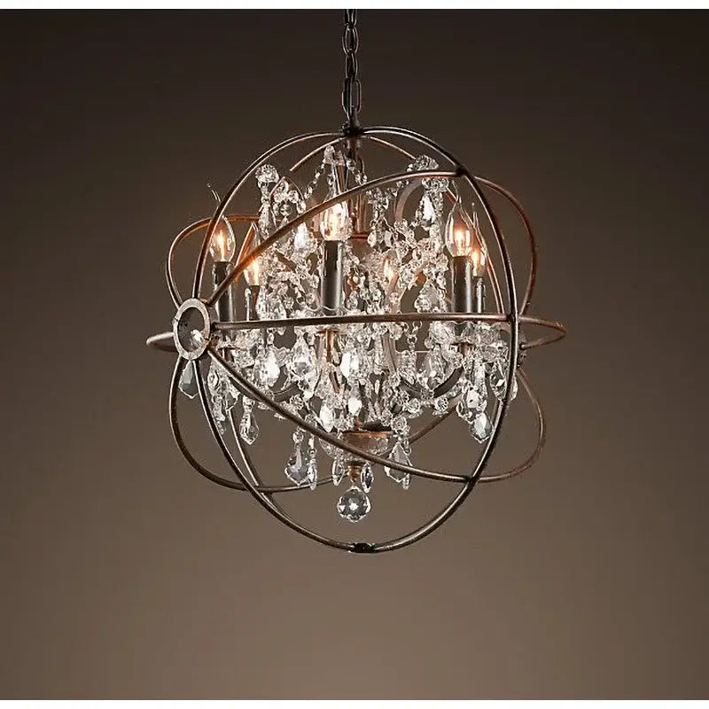 A spherical decorbites crystal chandelier with dark metal frame and clear crystal droplets for living room lighting