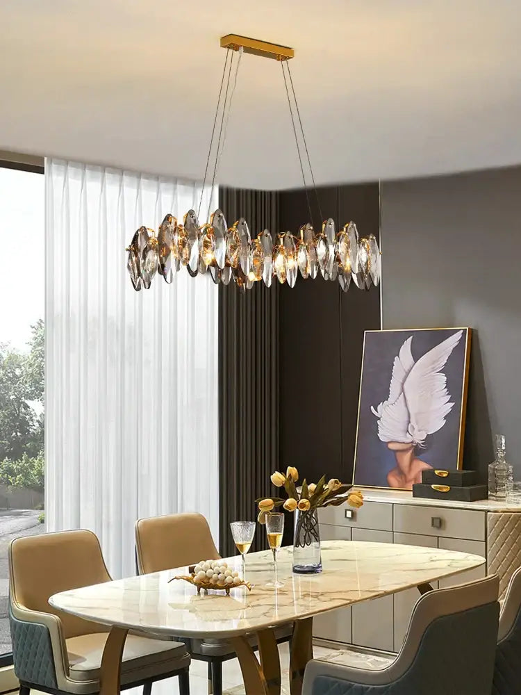 Gold-toned decorbites crystal chandelier with clear teardrop crystal pendants for living room and dining table lighting
