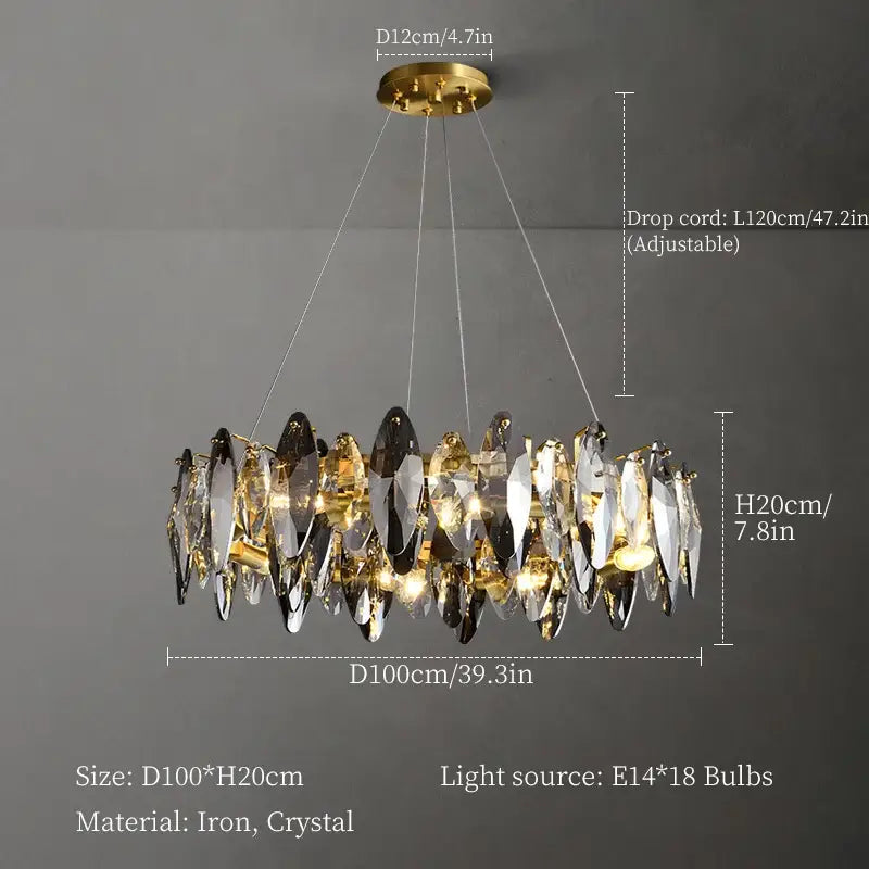 A decorbites crystal chandelier with clear and dark teardrop crystals on a gold iron mount for living room lighting
