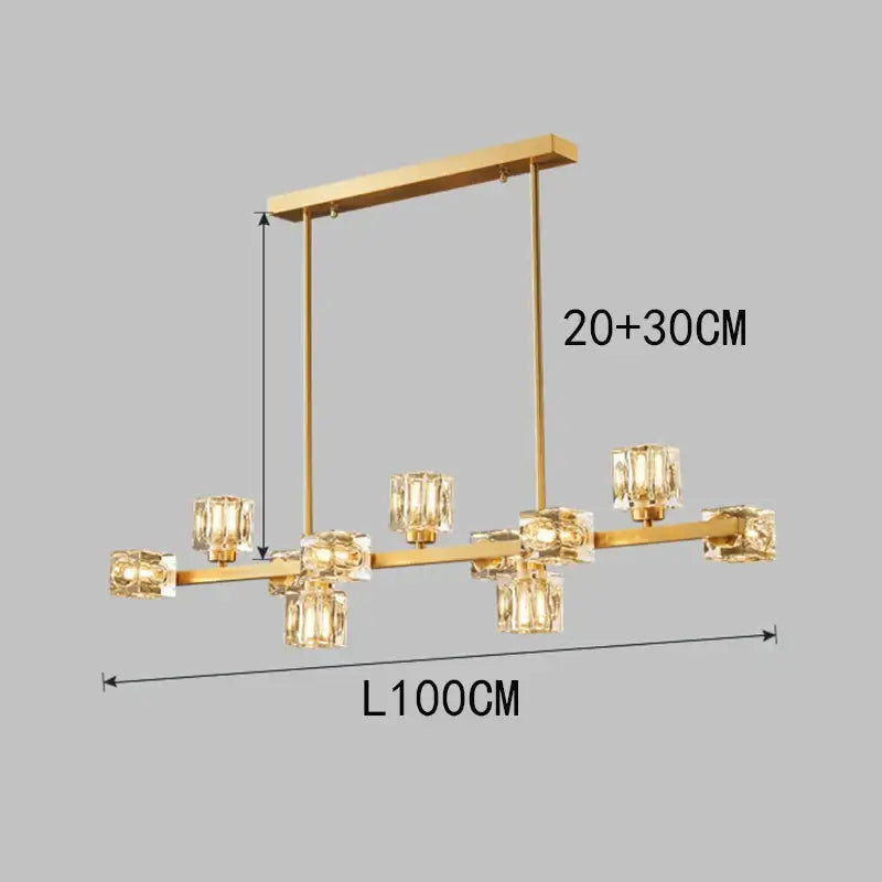 Gold-toned decorbites crystal chandelier with clear glass shades in a linear design for living and dining rooms