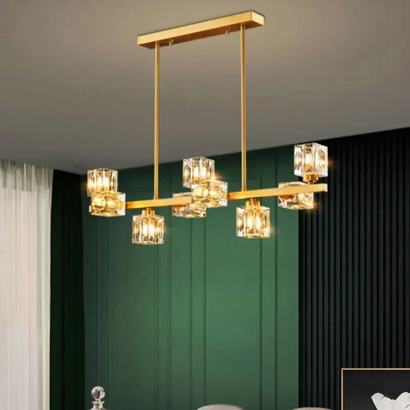 Gold-toned DecorBites crystal chandelier with clear crystal cube shades for elegant living and dining room lighting