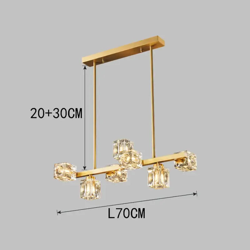 Gold-toned decorbites crystal chandelier with clear faceted crystal cube shades for living and dining room lighting