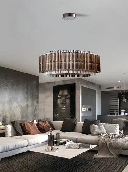 A modern decorbites crystal chandelier with metallic frame and copper-toned glass rods for living room decor