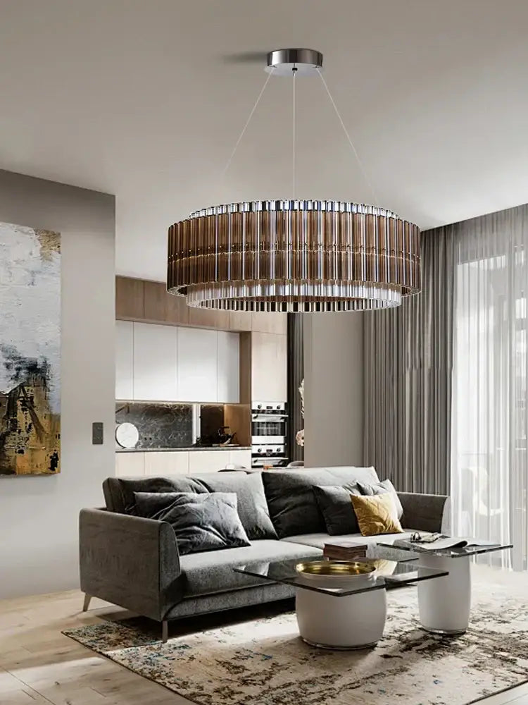 A modern decorbites crystal chandelier with metallic frame and vertical glass rods for living room and dining décor