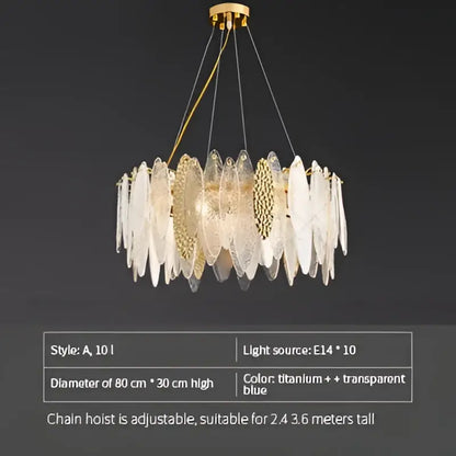 Gold-toned decorbites crystal chandelier with translucent blue and clear leaf-shaped shades in european style design