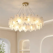 Elegant white glass leaf decorbites crystal chandelier with gold-toned ceiling mount for living room and bedroom lighting