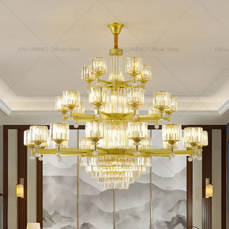 Gold-toned DecorBites crystal chandelier with tiered clear glass shades and dangling crystals for living room elegance
