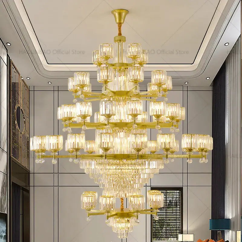 Golden multi-tiered decorbites crystal chandelier with clear glass shades and dangling crystals for elegant living rooms