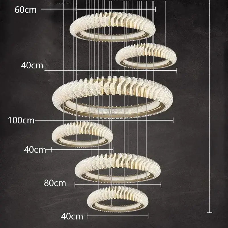 Modern spiral decorbites crystal chandelier with concentric rings and metallic finish for elegant living and dining rooms