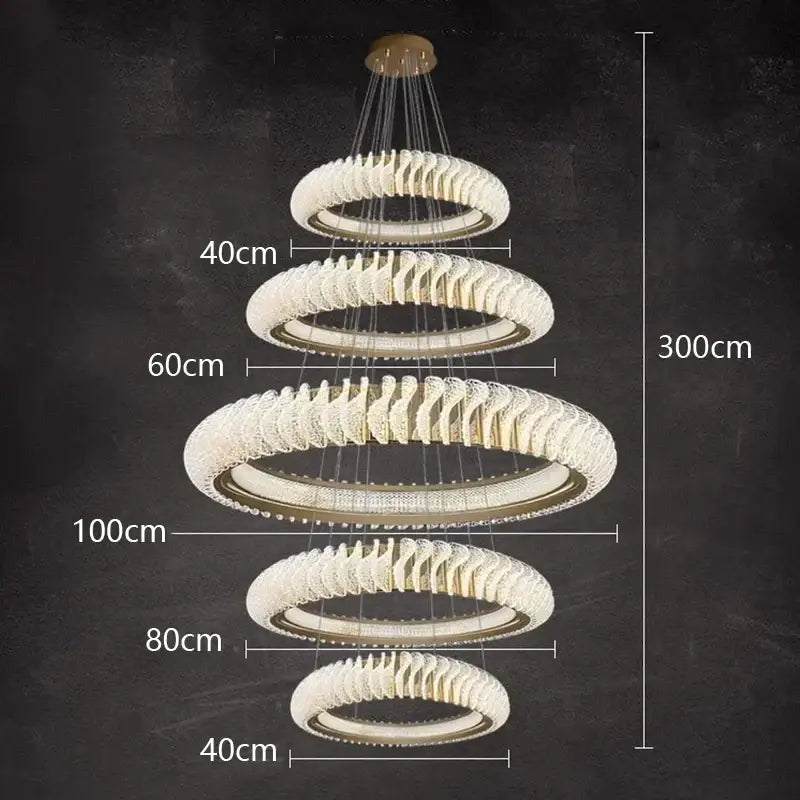 A modern decorbites crystal chandelier with cascading clear crystal rings and gold-toned metal for elegant living areas
