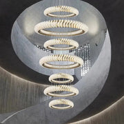 Modern spiral decorbites crystal chandelier with textured white rings and warm led lights for living and dining rooms