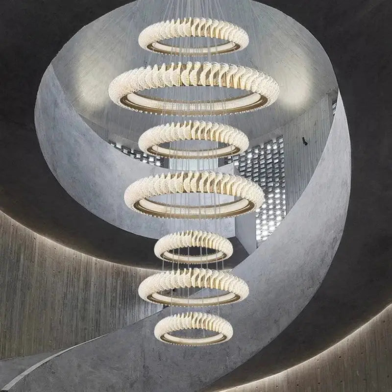 Modern spiral decorbites crystal chandelier with textured white rings and warm led lights for living and dining rooms