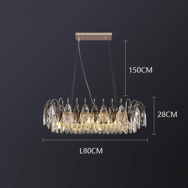 A modern decorbites crystal chandelier pendant light with rose gold finish and cascading clear crystal teardrop pendants