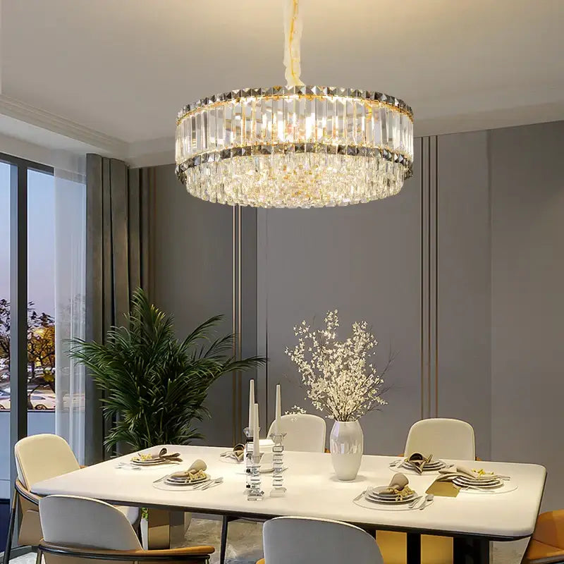 Decorbites crystal chandelier with gold-toned frame and clear faceted crystals for elegant modern lighting use