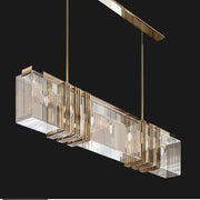 Gold-toned decorbites crystal chandelier with vertical crystal rods and recessed lighting for elegant interior decoration