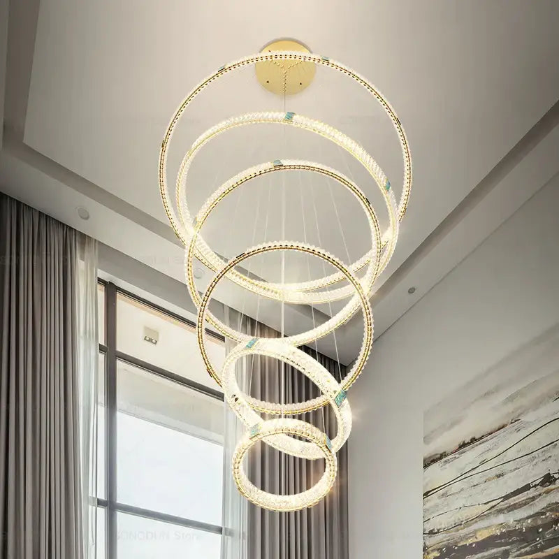 Modern decorbites crystal chandelier with concentric rings and warm led lights for living room and restaurant lighting