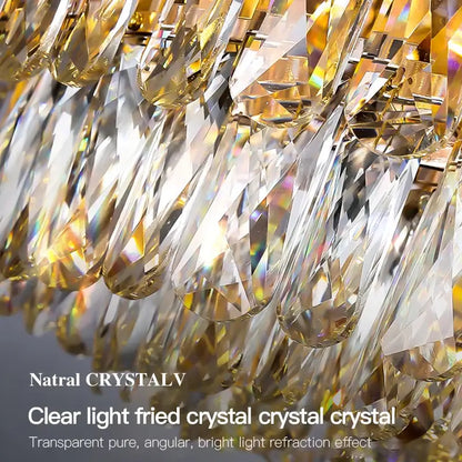 Decorbites crystal chandelier cascading with clear angular crystal droplets refracting golden light for living room lighting