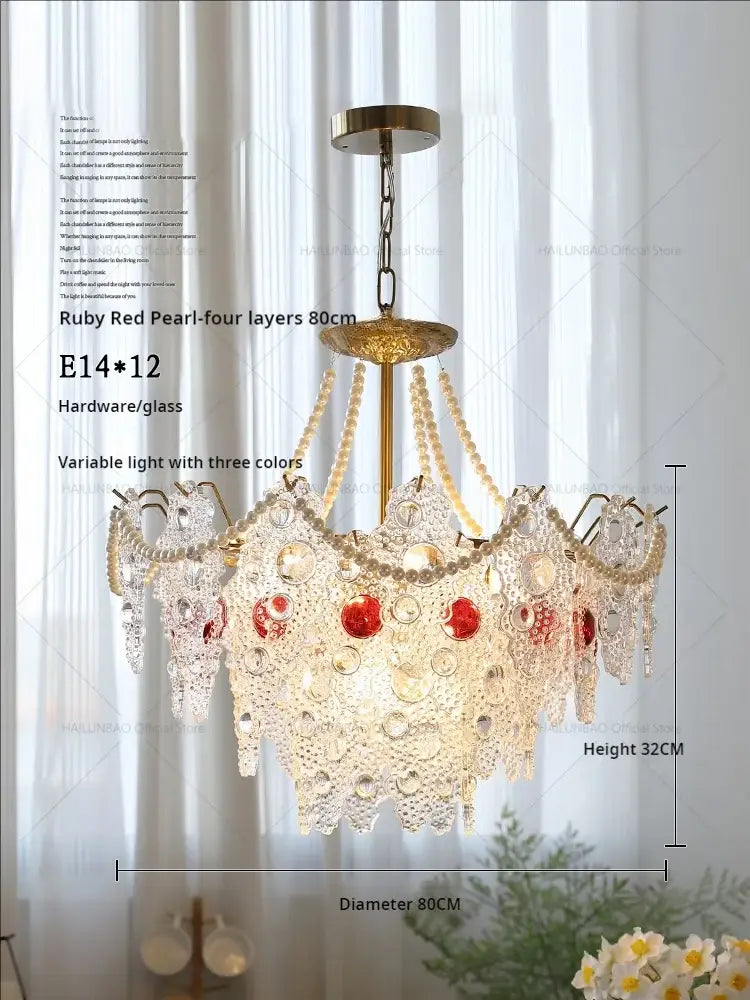 A decorbites crystal chandelier with four layered glass tiers adorned with red and clear beads for elegant retro lighting