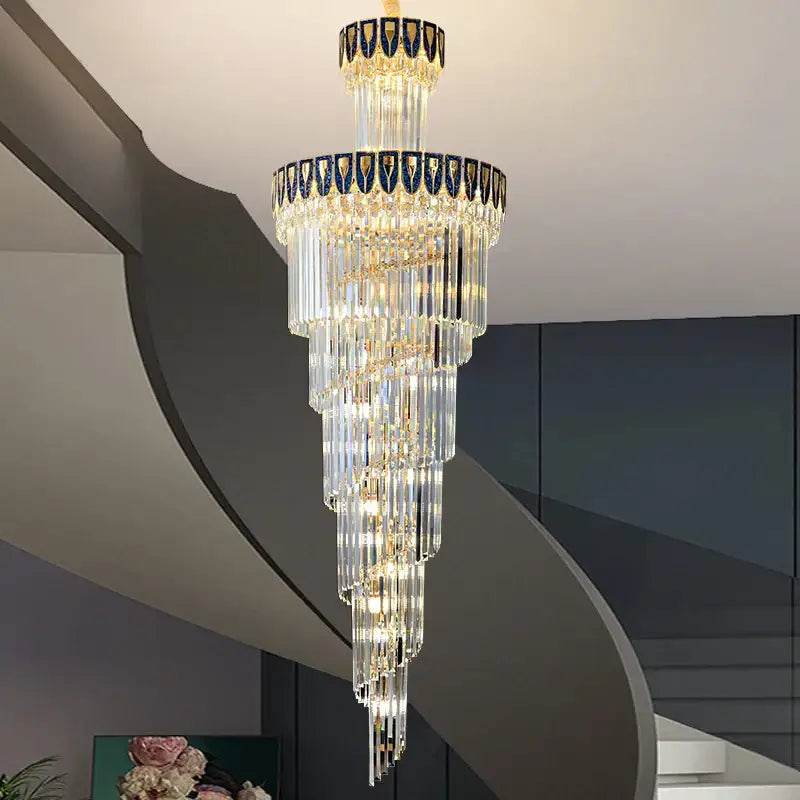 Decorbites crystal chandelier with cascading clear glass prisms gold accents and blue mosaic trim for elegant villa lighting