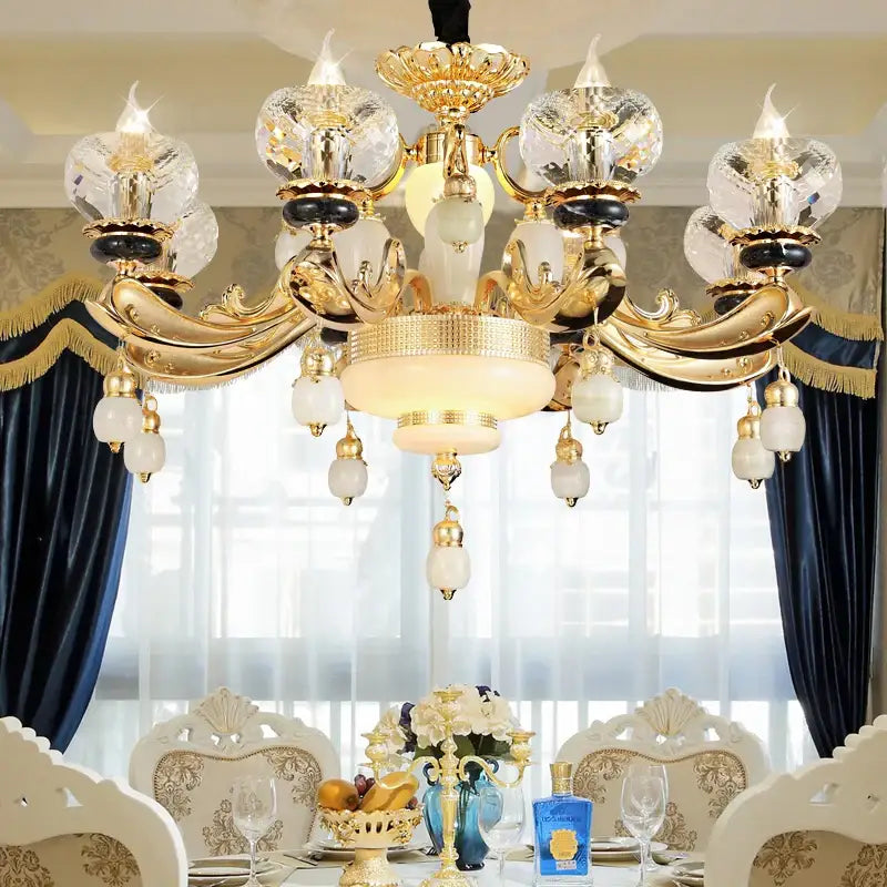 Gold-toned decorbites crystal chandelier with globe crystal shades and white opal pendants for living and dining rooms