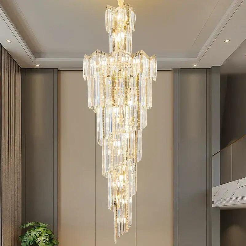 DecorBites crystal chandelier with multi-tiered clear glass prisms and gold accents for elegant villa hotel lighting