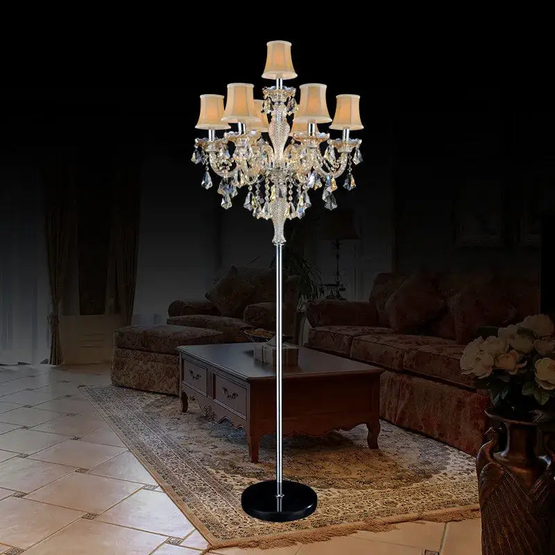 DecorBites crystal chandelier floor lamp with six beige fabric shades and crystal droplets on chrome pole for elegant decor