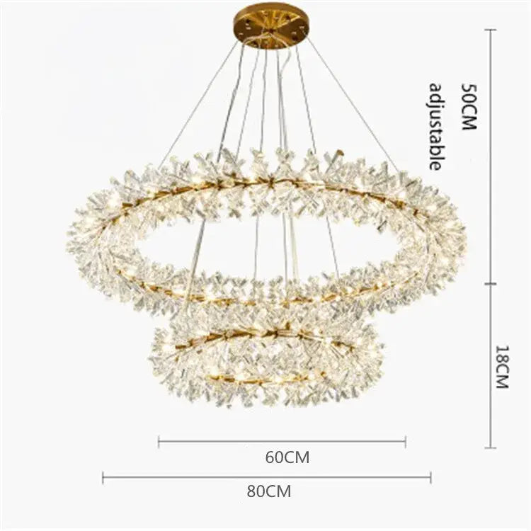 Gold-toned decorbites crystal chandelier with double rings adorned with sparkling clear crystal shards for indoor use