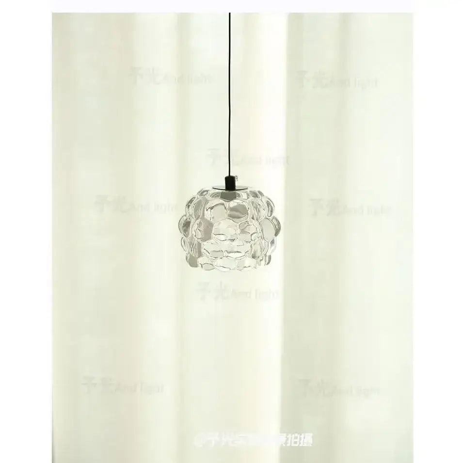 Clear glass decorbites crystal chandelier with textured bubble-like spherical design for clothing store cashier area