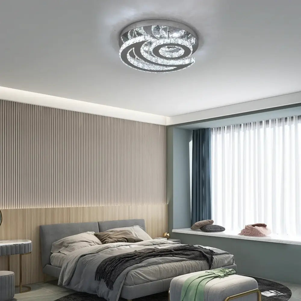 Modern decorbites crystal chandelier ceiling light fixture with swirling crystal rings and sleek chrome finish for home decor
