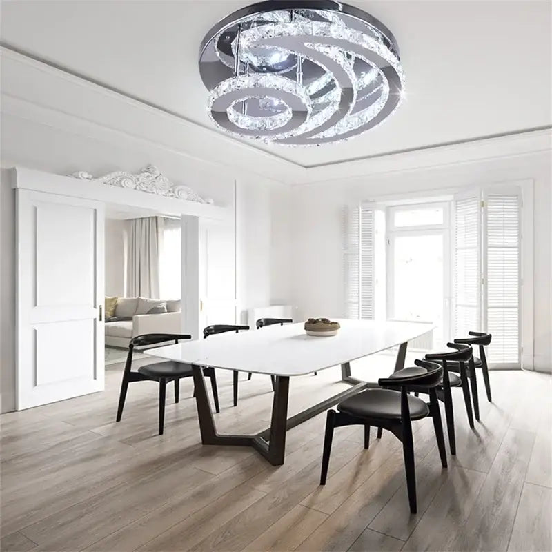Modern DecorBites crystal chandelier ceiling light fixture with layered crystal rings and sleek chrome frame for home decor
