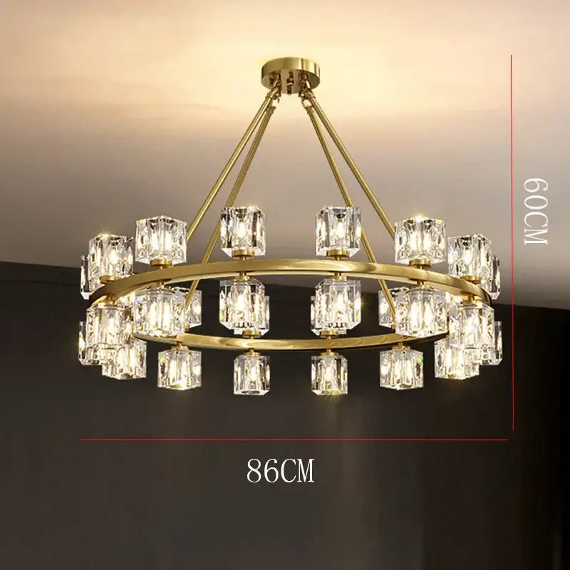 Gold-toned decorbites crystal chandelier with two concentric rings of faceted crystal pendants for living room lighting