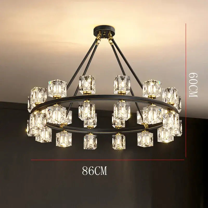 Black metal decorbites crystal chandelier with two tiers of faceted crystal cubes and gold-toned accents for living and dining room lighting
