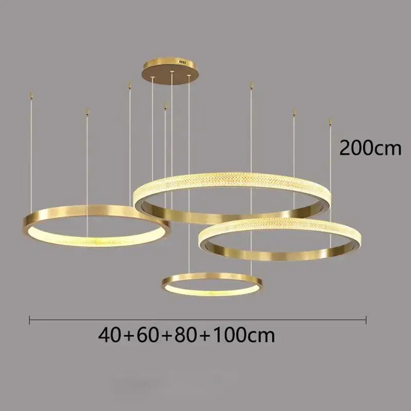 Modern gold-finished decorbites crystal chandelier pendant light with layered rings and textured inner surface for living room