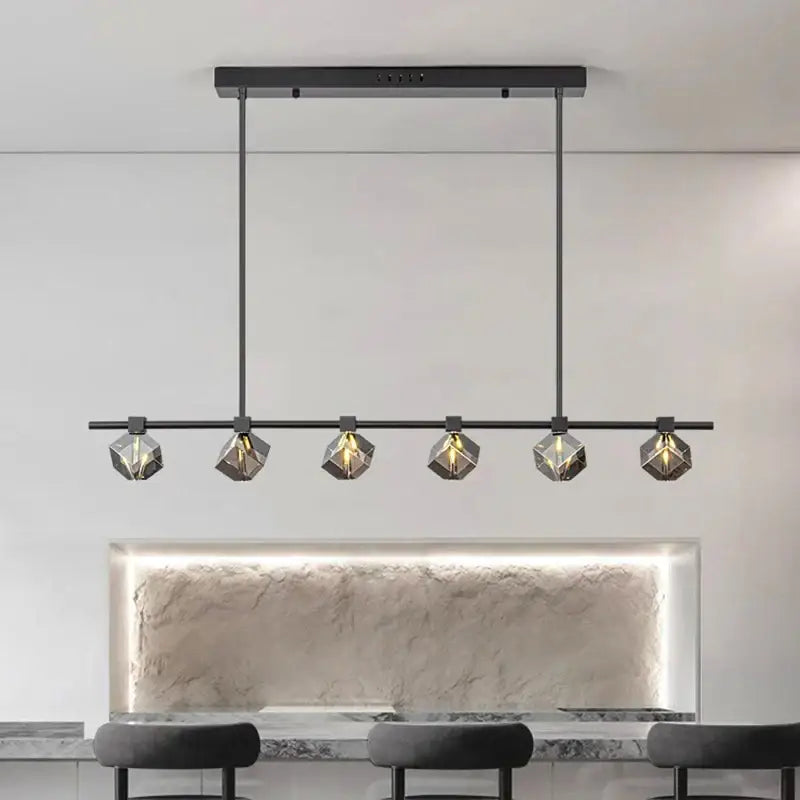 Modern black metal decorbites crystal chandelier with five faceted glass shades emitting warm glow for living and dining room