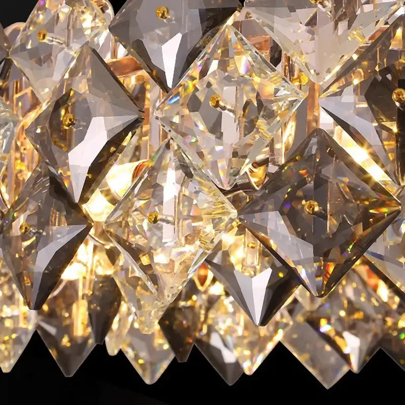DecorBites crystal chandelier with faceted clear and golden glass prisms in cascading design for living and dining rooms