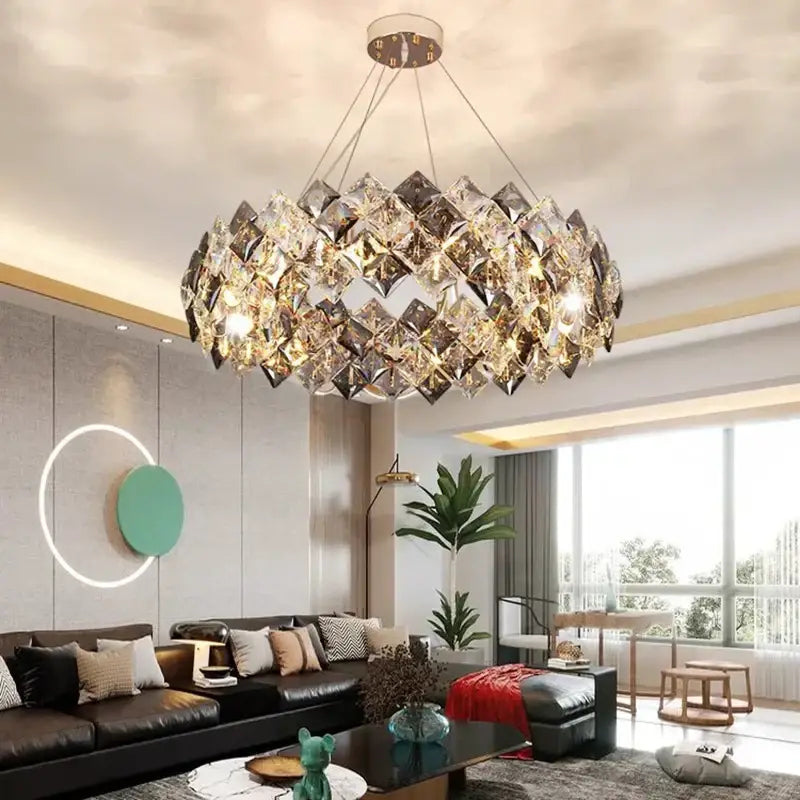 A modern circular decorbites crystal chandelier with faceted crystal layers for luxury living and dining rooms