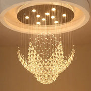 A modern decorbites crystal chandelier with clear faceted crystals and a circular ceiling mount for elegant indoor use