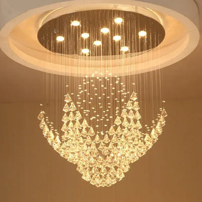 A modern decorbites crystal chandelier with clear faceted crystals and a circular ceiling mount for elegant indoor use