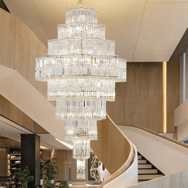 Decorbites crystal chandelier with cascading rectangular prisms in a modern European duplex villa hall luxury interior