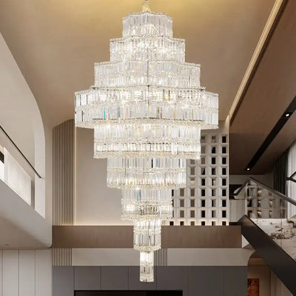 DecorBites crystal chandelier with cascading rectangular prisms glowing warmly in a post-modern European duplex villa