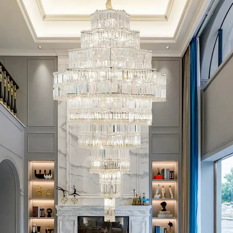 Decorbites crystal chandelier with cascading rectangular prisms and gold-toned fixture for post-modern luxury hall