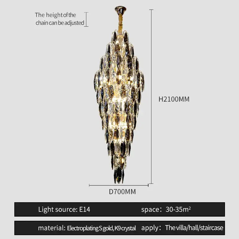 A tall decorbites crystal chandelier with cascading clear and dark crystals in electroplated gold for luxe decor