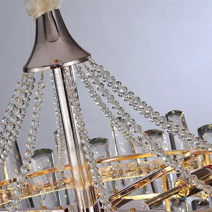 Decorbites crystal chandelier with polished chrome and gold finish featuring clear crystal beads for luxe home decor
