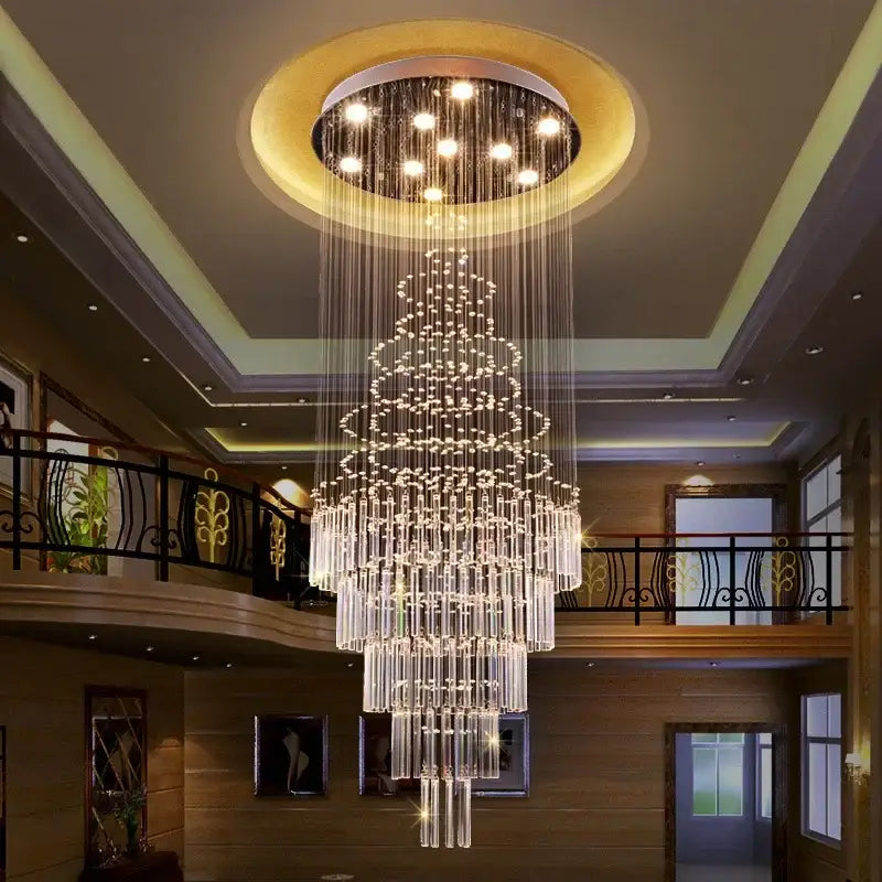 A modern multi-tiered decorbites crystal chandelier with cascading glass rods and embedded lights for living rooms