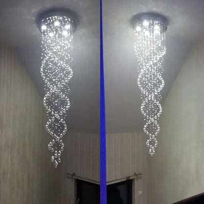 A decorbites crystal chandelier with cascading glass beads and lights for luxury staircase hotel bedroom decor