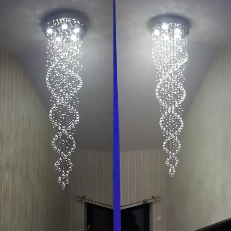 A decorbites crystal chandelier with cascading glass beads and lights for luxury staircase hotel bedroom decor