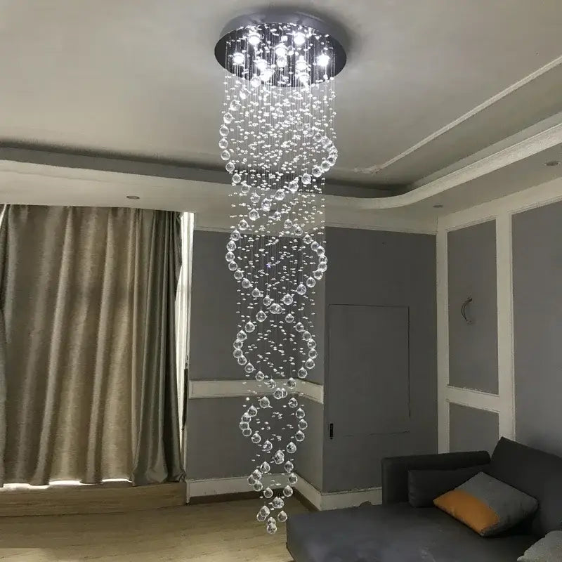 A modern decorbites crystal chandelier with a black metal base and spiral clear glass beads for luxury spaces